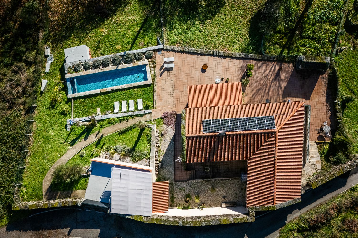 The house sits in a private land of about 1,200 square meters